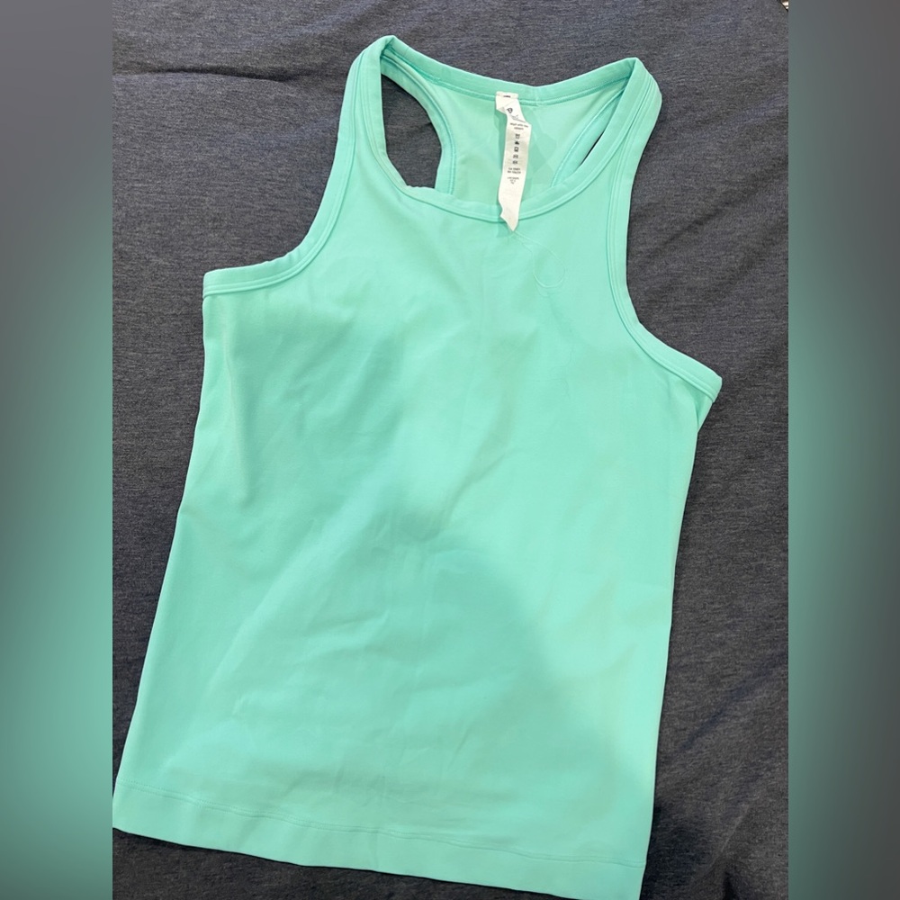 Almost new Lululemon workout top in mint green